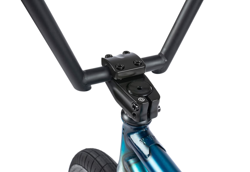 Close-up of a bicycle handlebar with black grips on a white background