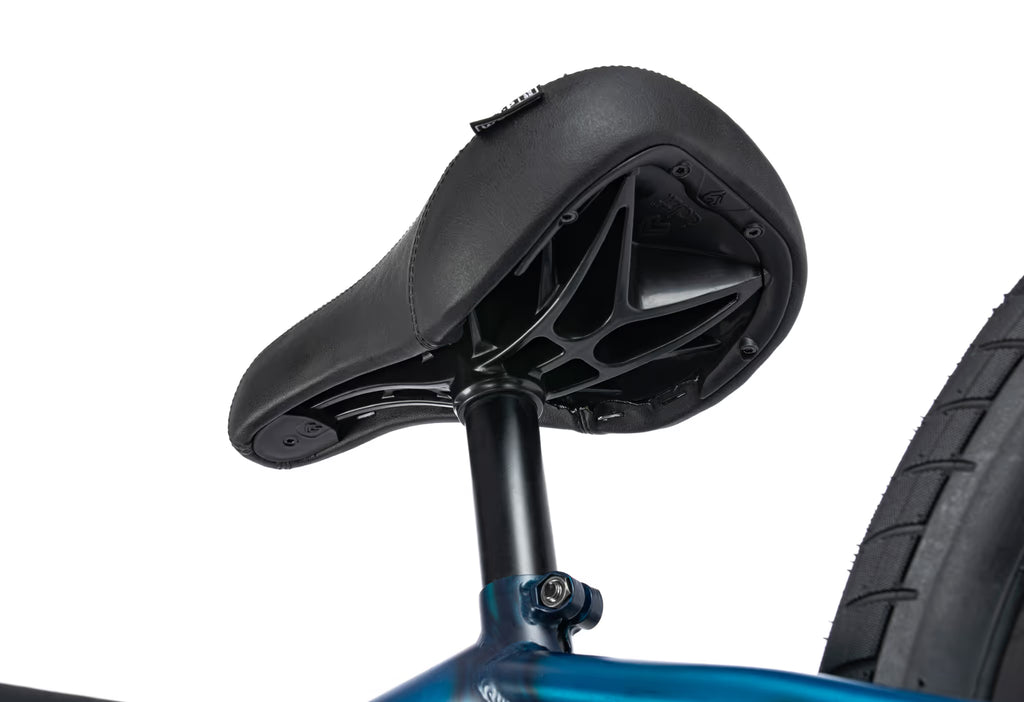 Close-up of a bicycle seat and frame on a white background